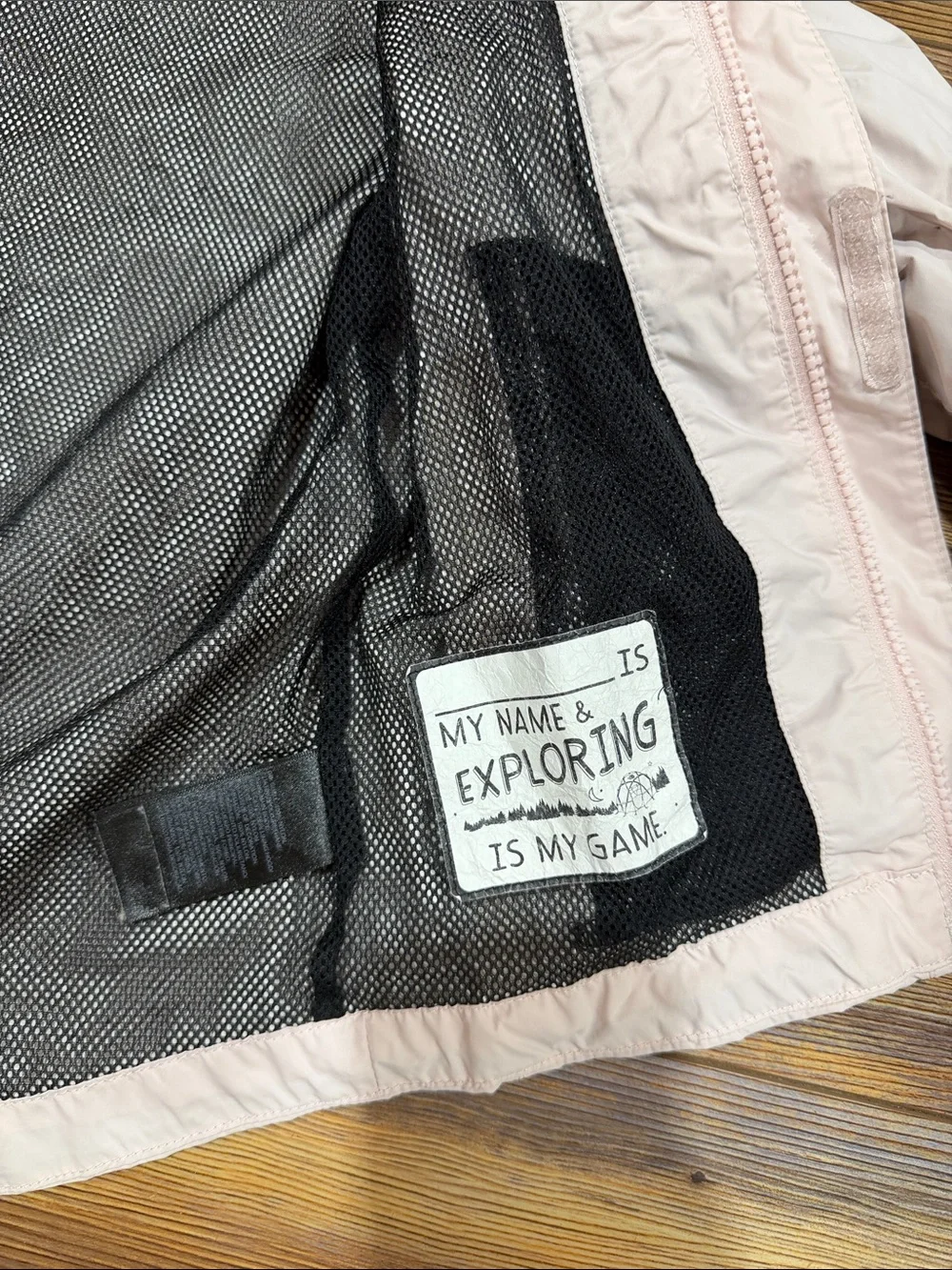 The North Face Kids Hooded Rain Jacket in Light Pink and Black
